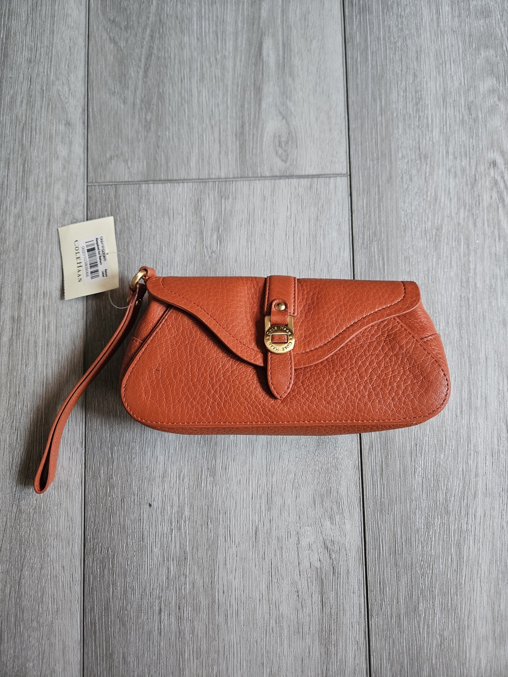 Cole Haan Burnt Orange Pebbled Leather Wristlet with Gold-Tone Lock